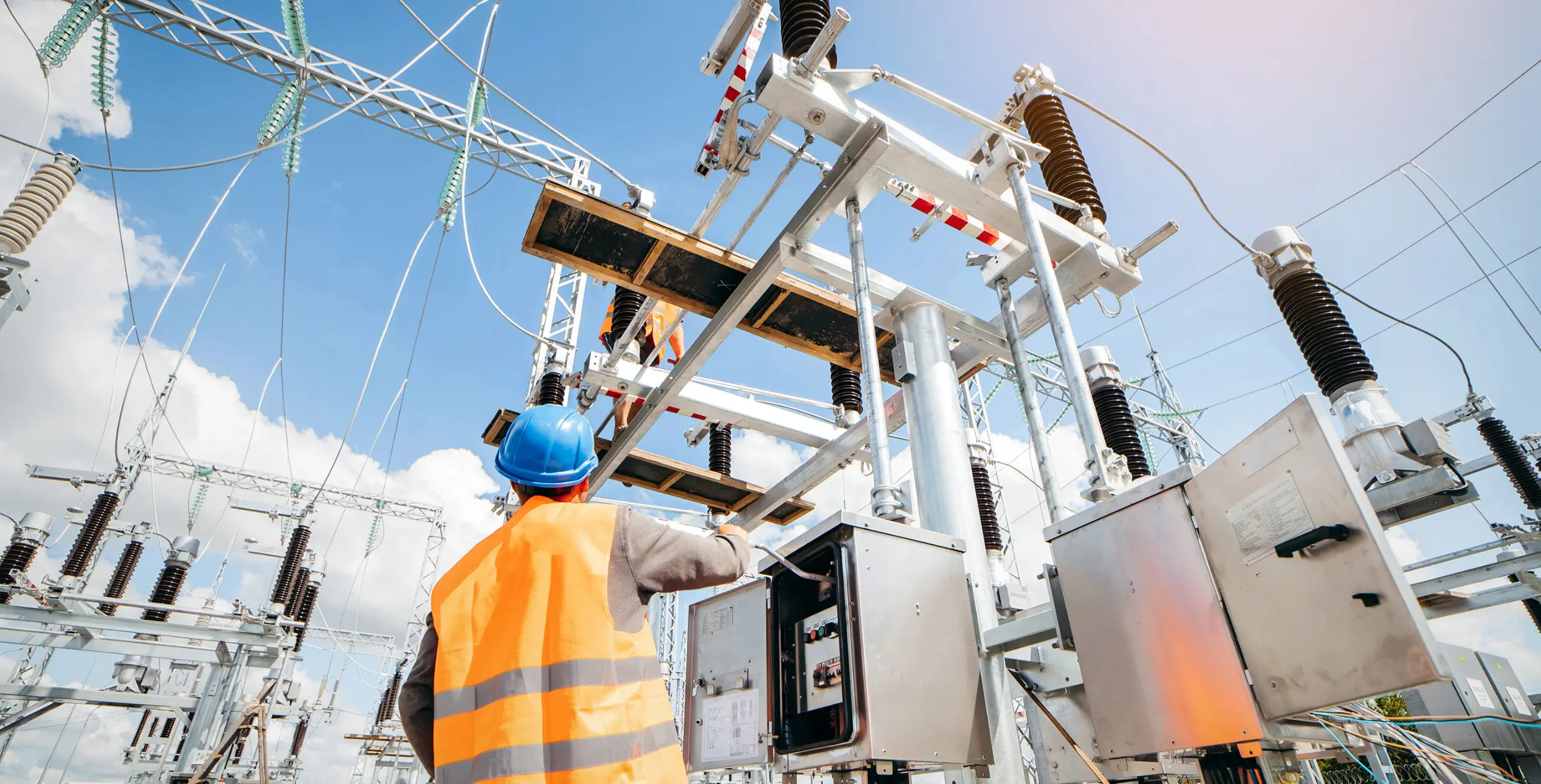 Electrical technician working on utility and distribution equipment